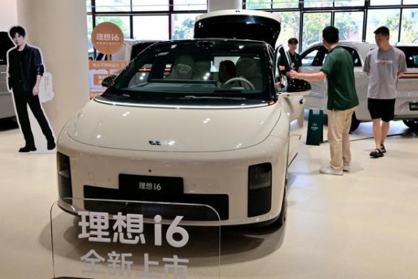 忠琦配资 实探国庆新能源车市：多款车下定要等数月，消费者抢搭“免税末班车”